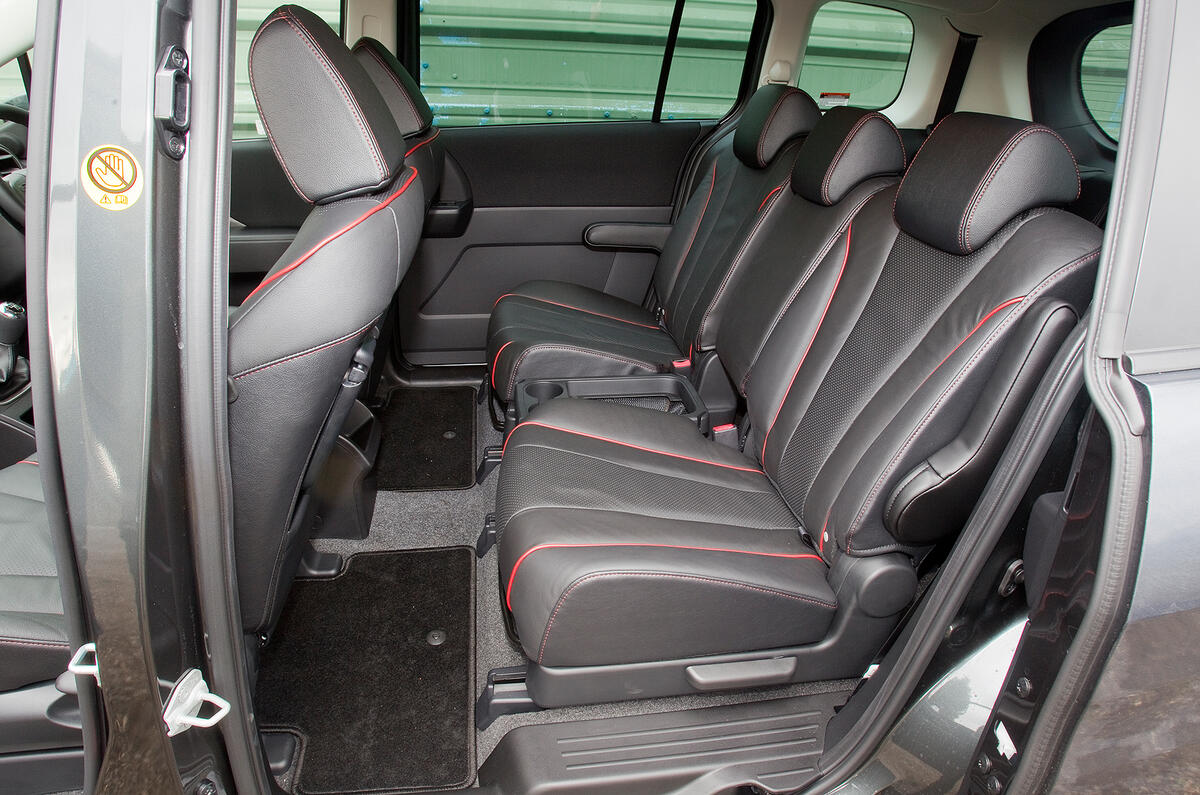 Middle row of seats slide fore and aft, and tip forwards to access the two children only third-row seats Mazda 5 middle row seats