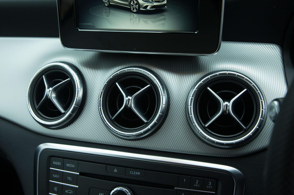 The triple air vents located on the central console