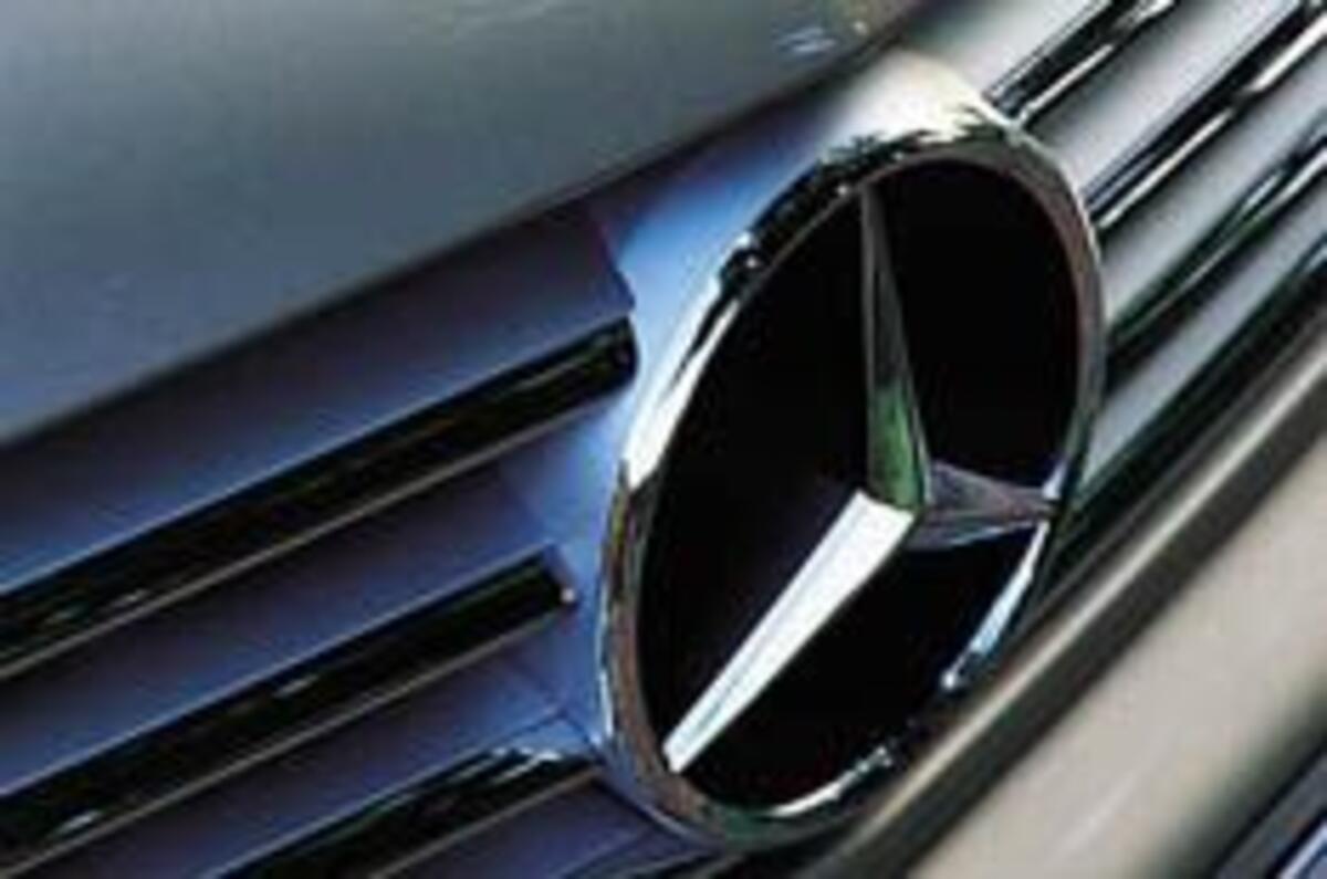 Mercedes-Benz skids close to the red