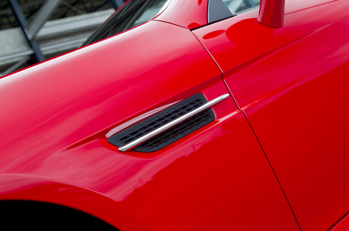 The chrome fin in the side vents is a visual nod to the 1950's 190 SL Mercedes-Benz SLK side vents