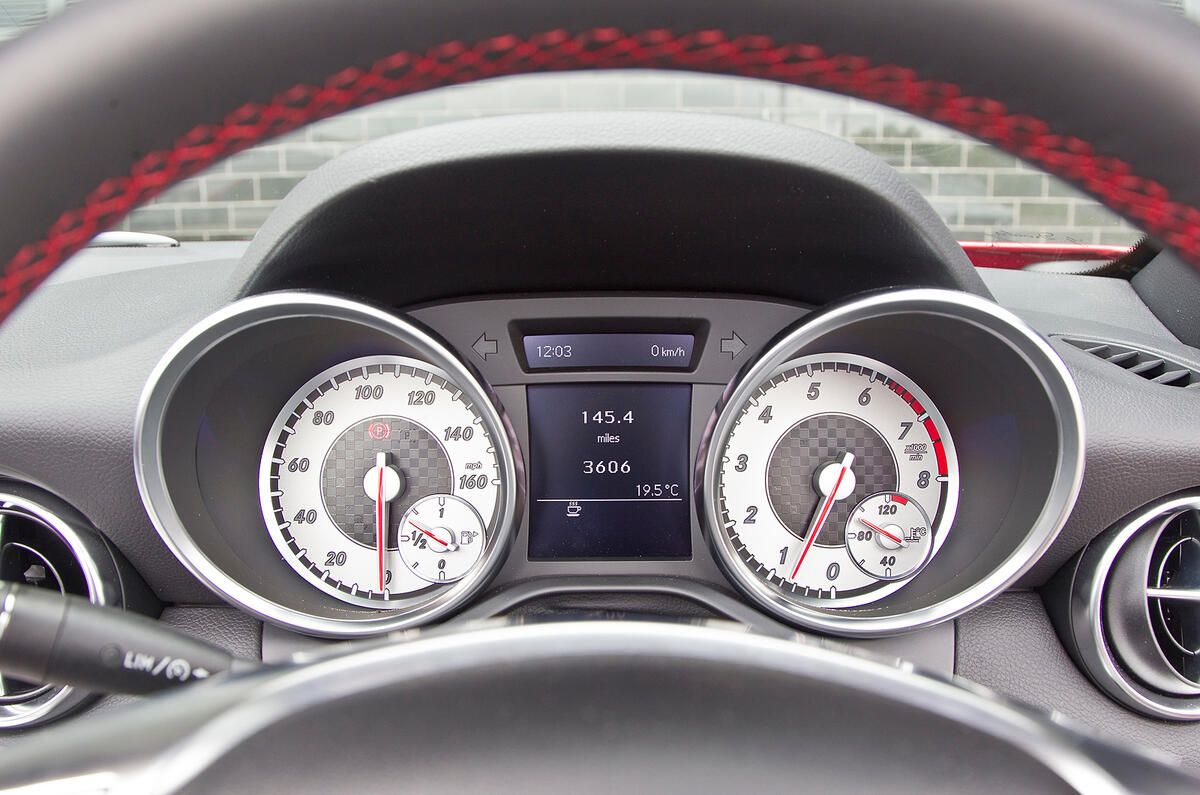 Dials look good and are easily to read but a colour central info screen would be useful Mercedes-Benz SLK instrument cluster