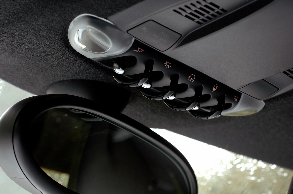 Roof-mounted switchgear echoes the design of the switches on the console Mini Clubman headlining lights