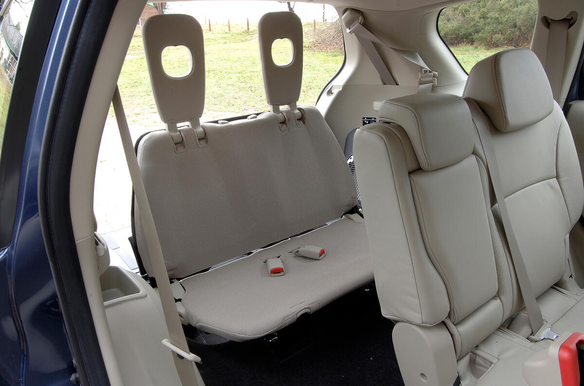Novel rearmost seats  are lightweight, but they feel it when you try to sit on them Mitsubishi Outlander third row seats