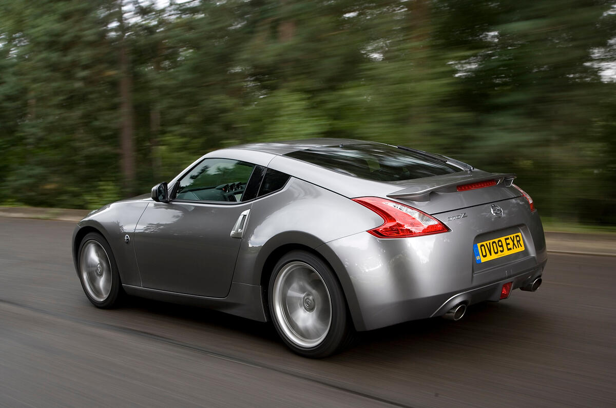 When we compared it with a Porsche Cayman in a straight line, the Porsche, in real-world terms, failed to keep up Nissan 370Z rear quarter