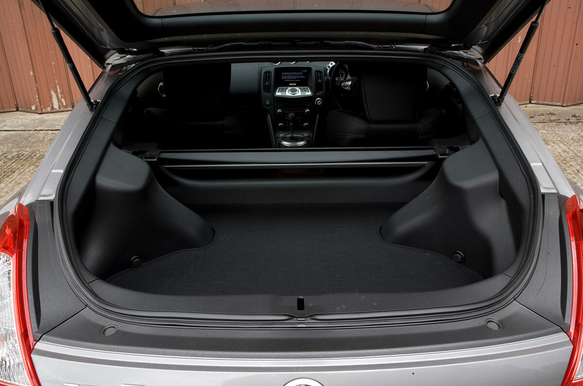 Boot is shallow and the suspension turrets and cross-brace are still intrusive Nissan 370Z boot space