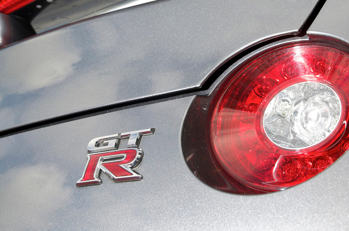 The four-round tail-lamps are a familiar GT-R touch Nissan GT-R badging
