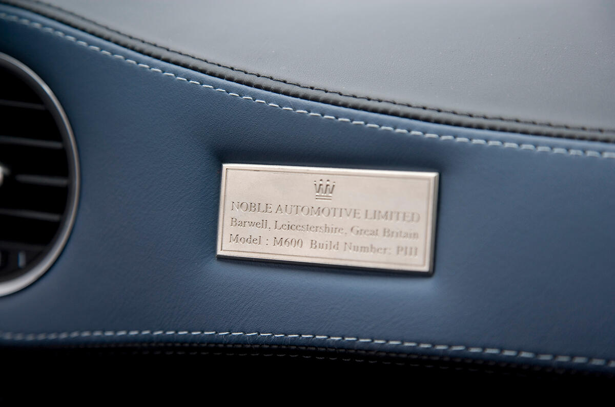 Plate on the M600's doors announces its provenance Noble M600 builder's plaque