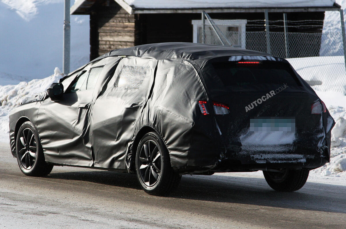 New Peugeot 508 estate spied