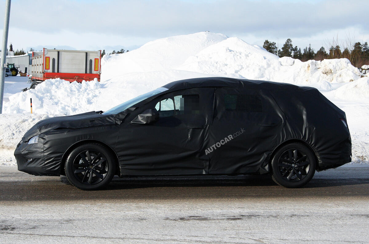 New Peugeot 508 estate spied