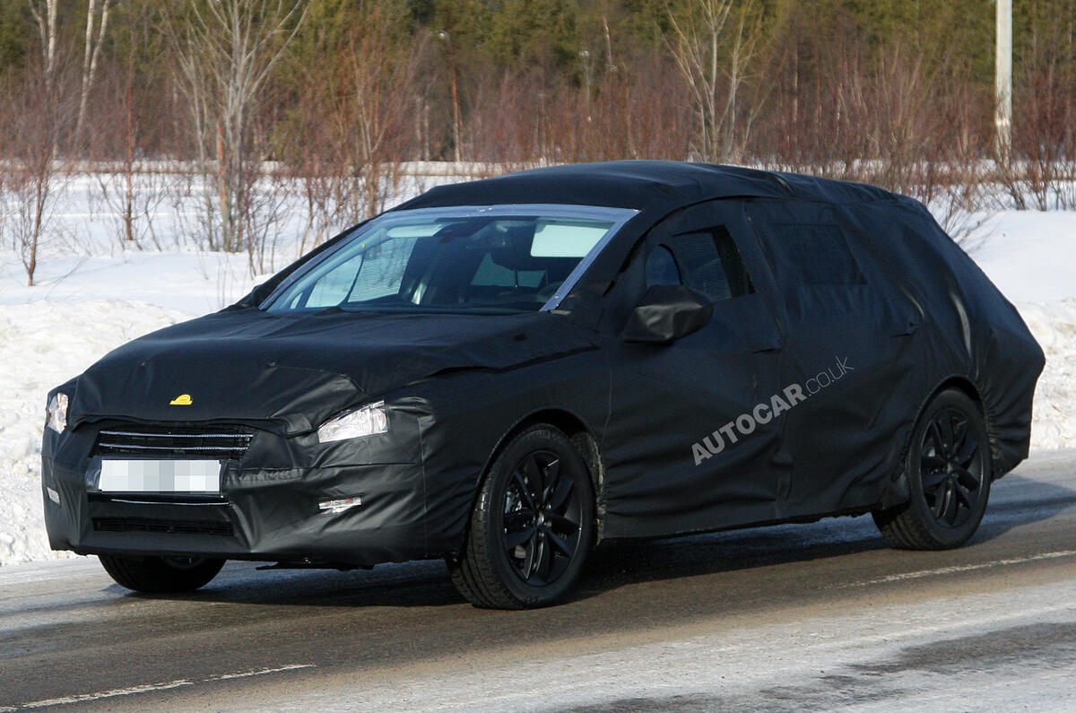 New Peugeot 508 estate spied