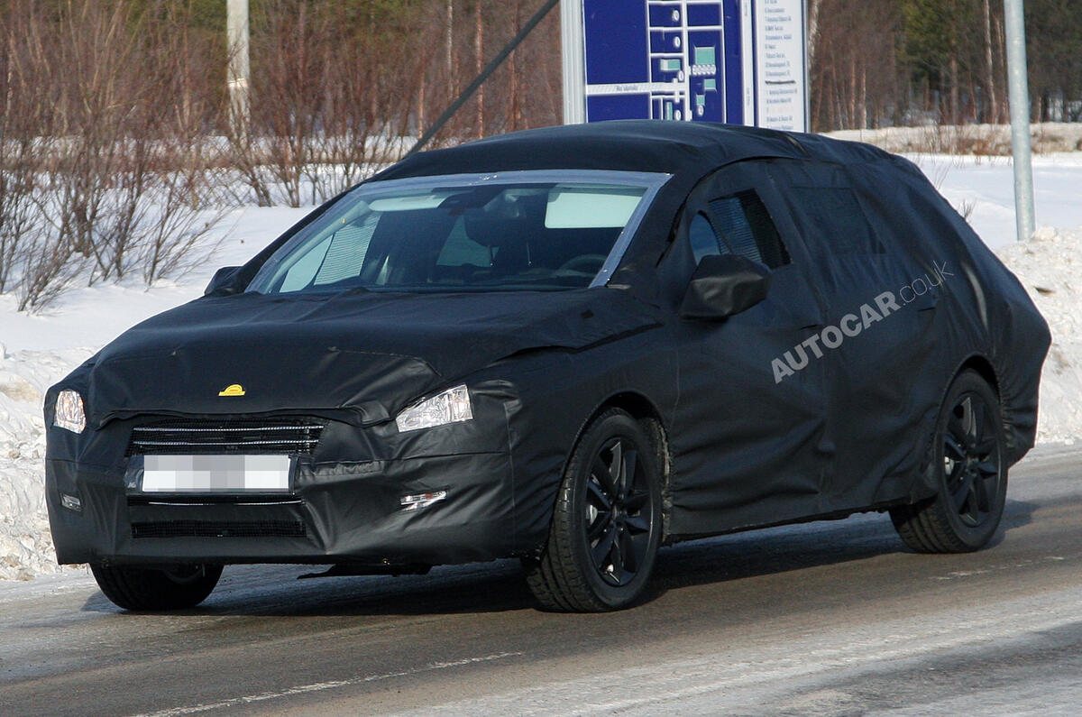New Peugeot 508 estate spied