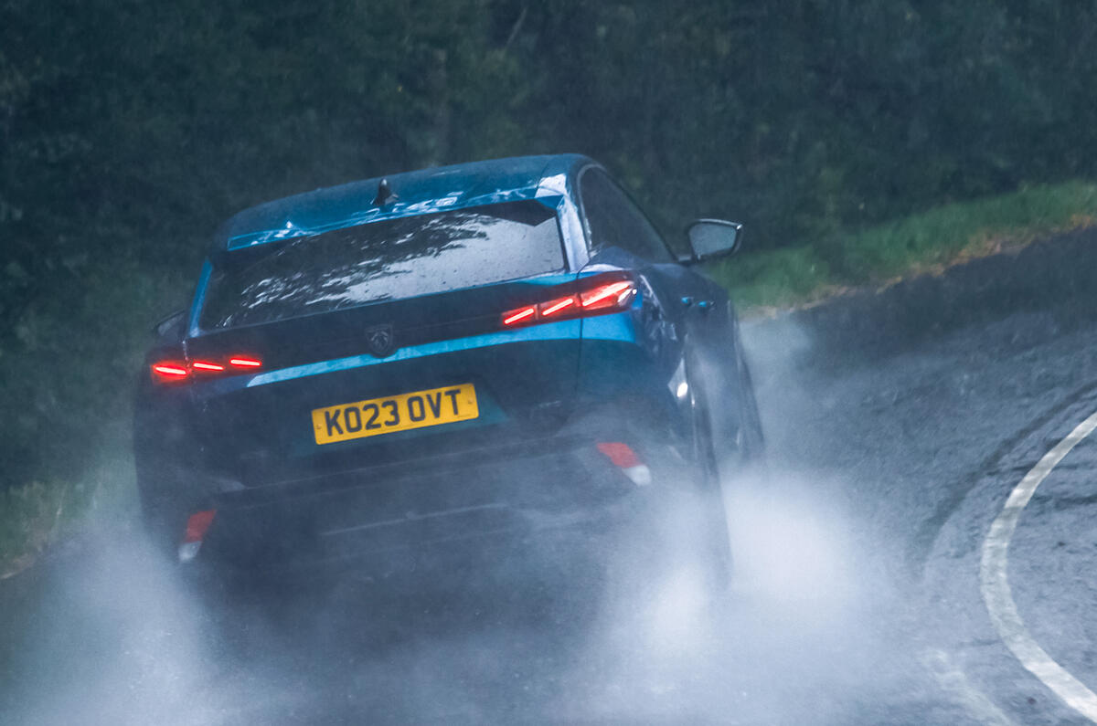 peugeot 408 review 2023 019 cornering rear peugeot 408 review 2023 019 cornering rear