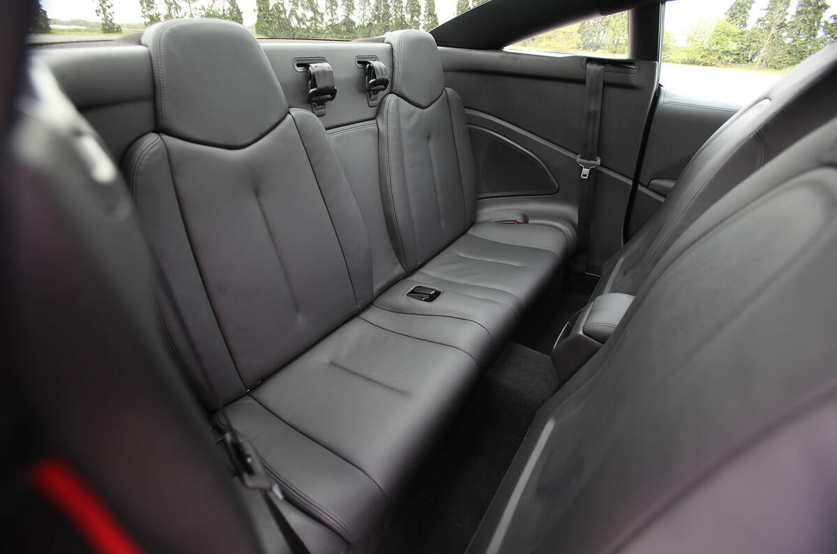 Adults won’t like it in the back. The small seats are upright and space is tight Peugeot RCZ rear seats