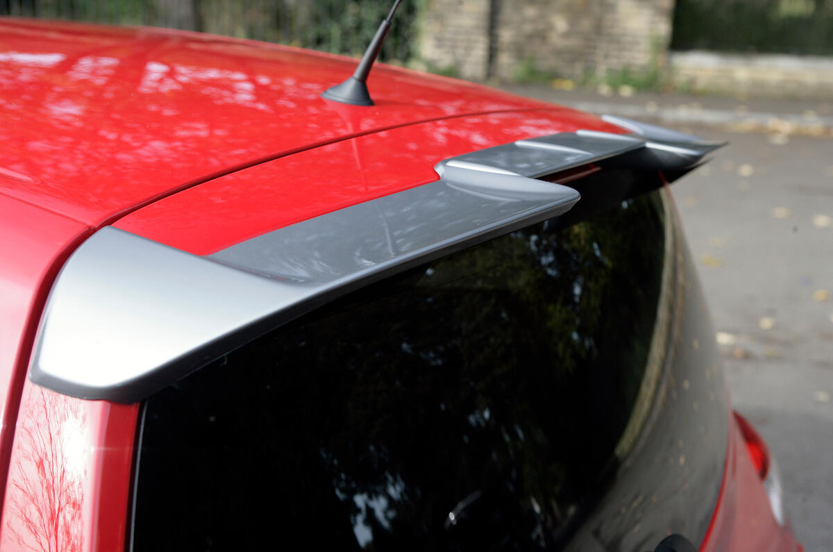 The huge rear wing has little aero benefit but lifts the Twingo's looks Renault Twingo RS roof spoiler