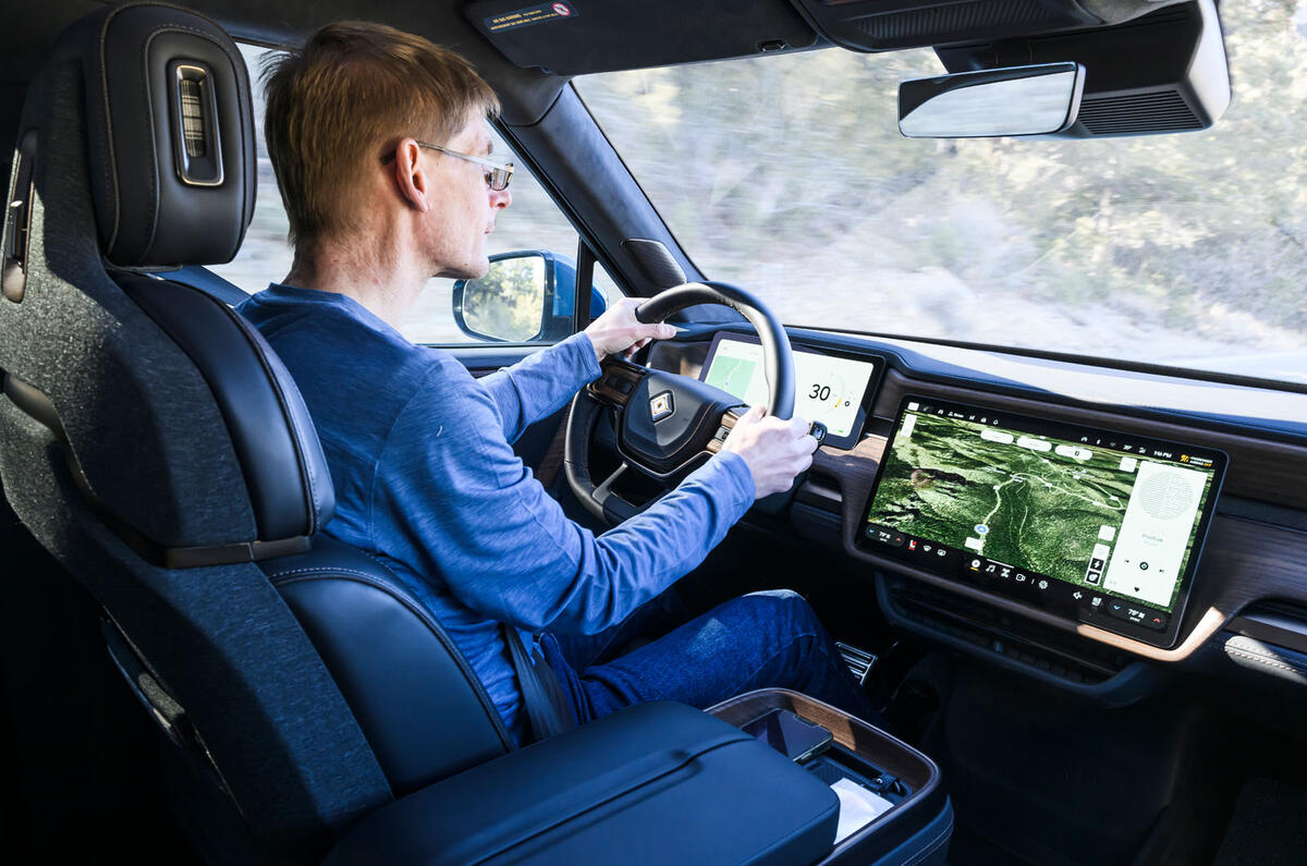 Rivian R1T 2025 Review LIPMAN over shoulder driving 14496