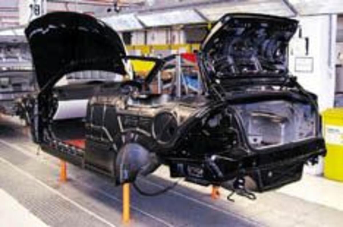 GM stalls 9-3 Coupé