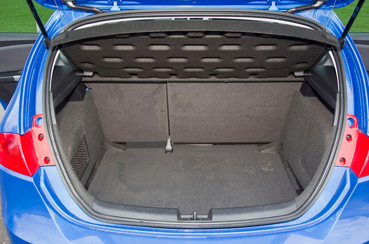 Luggage space is on par with the rest of the class, but odd-shaped boot opening restricts access slightly Seat Leon boot space