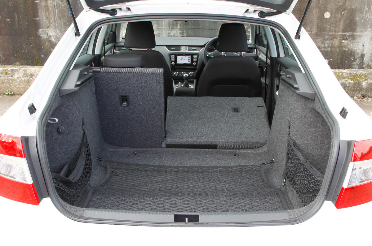 Longer items should fit easily if you drop the rear seats