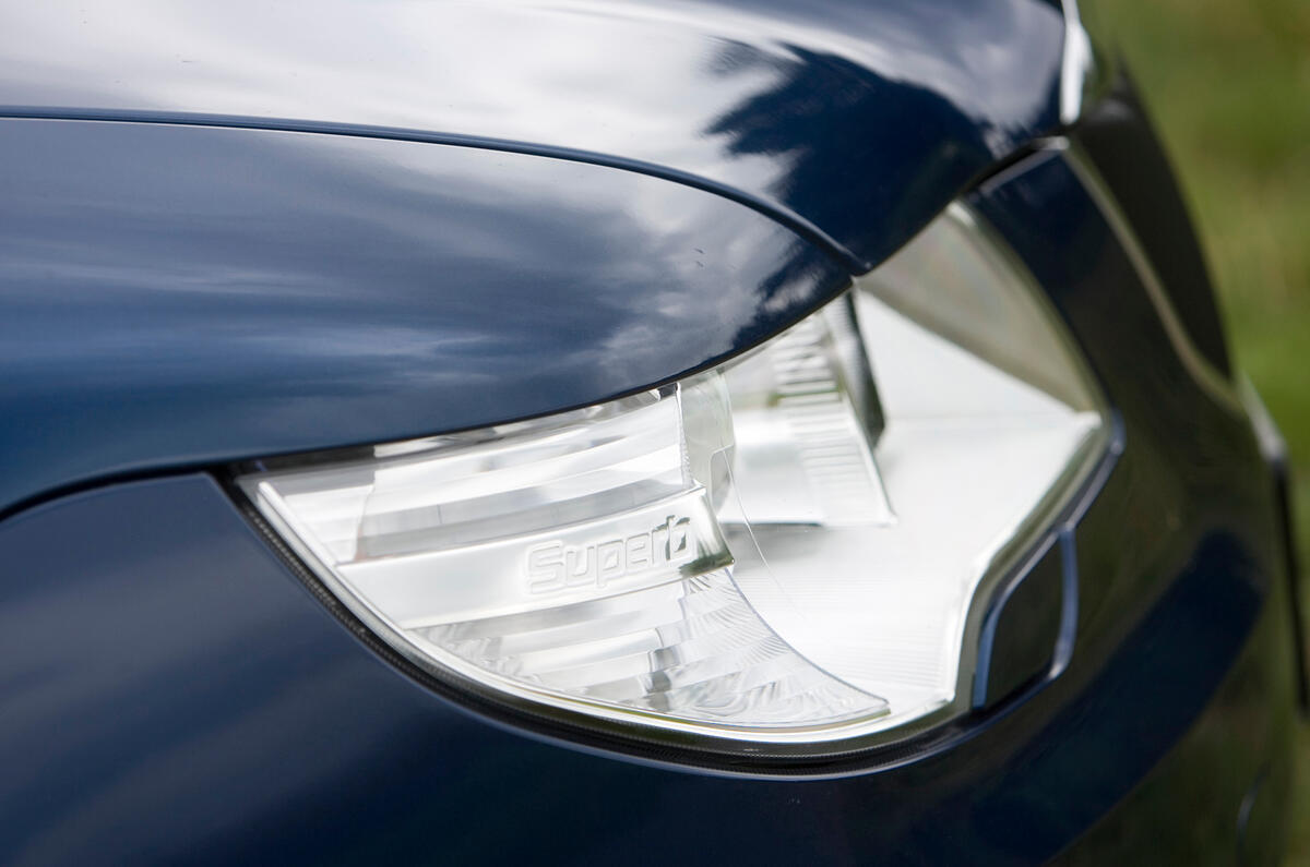 Adaptive headlights can alter beam shapes, and also incorporate cornering lights Skoda Superb headlight