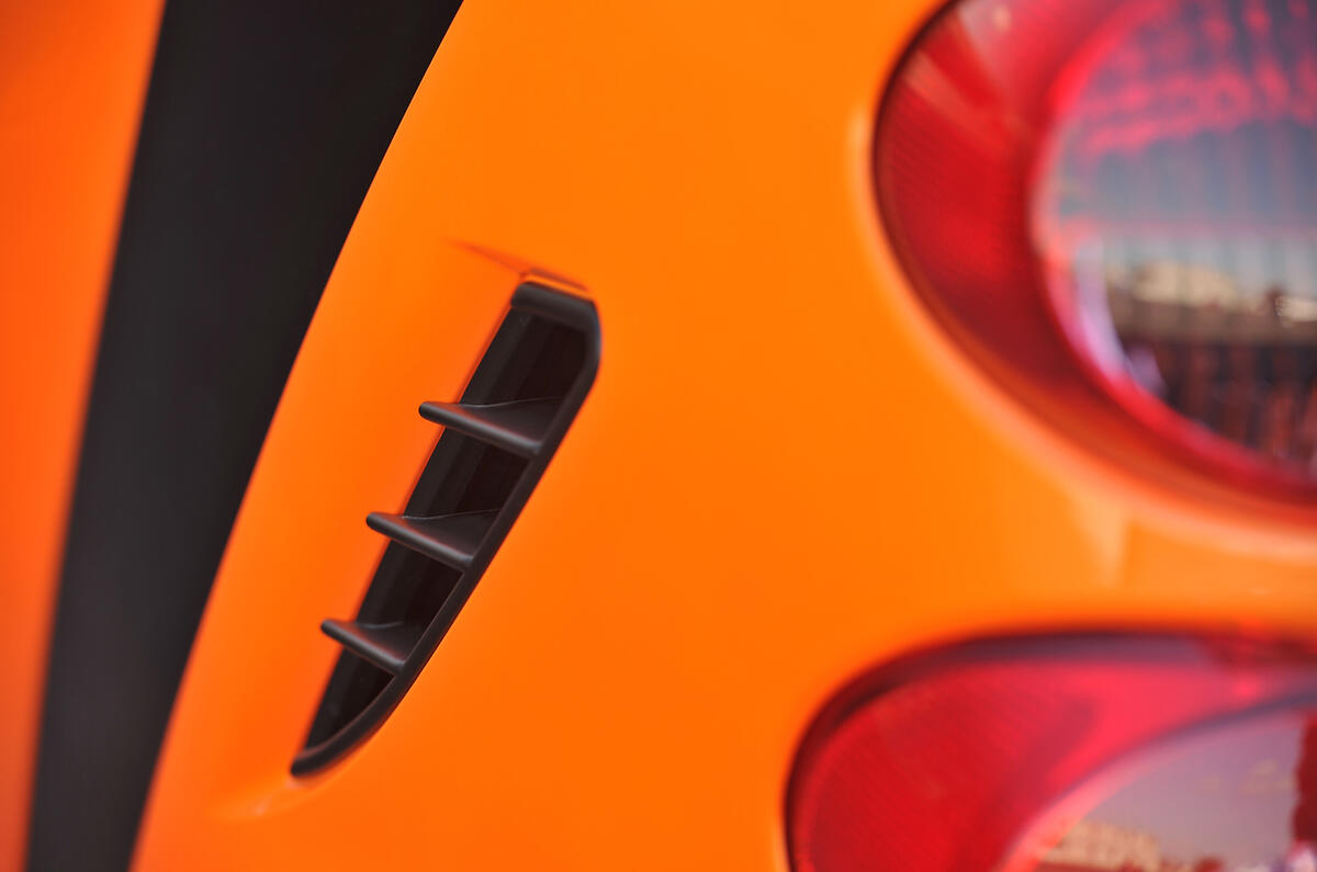 Instead of a false fuel filler on one side, the Smart now gets an air intake Smart Fortwo false filler cap