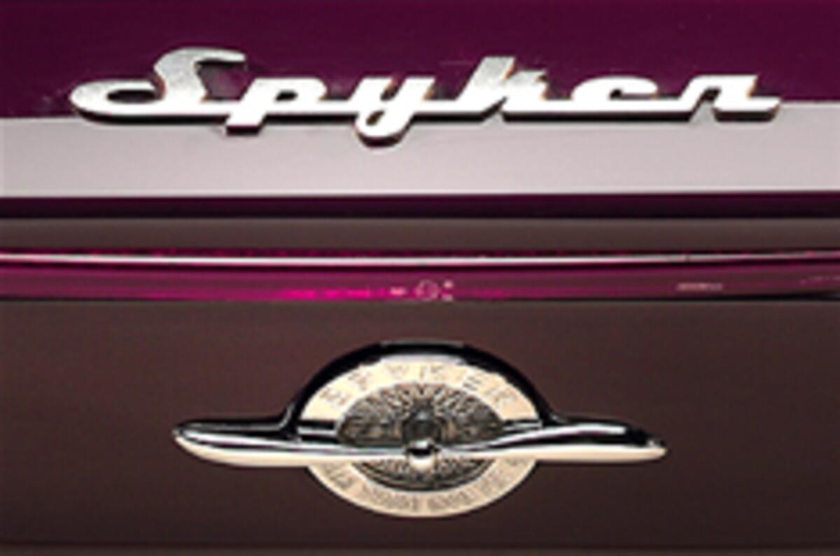 Spyker boss survives gun attack
