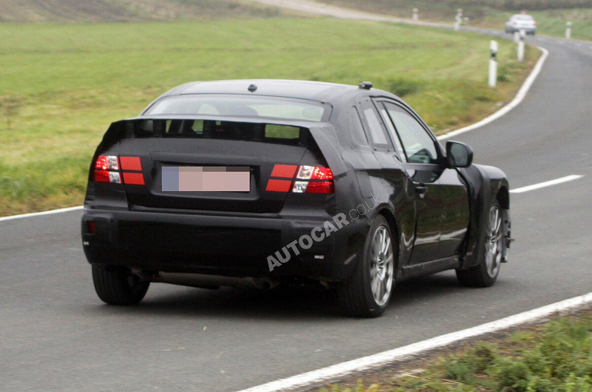 no title Subaru's STI coupé spied