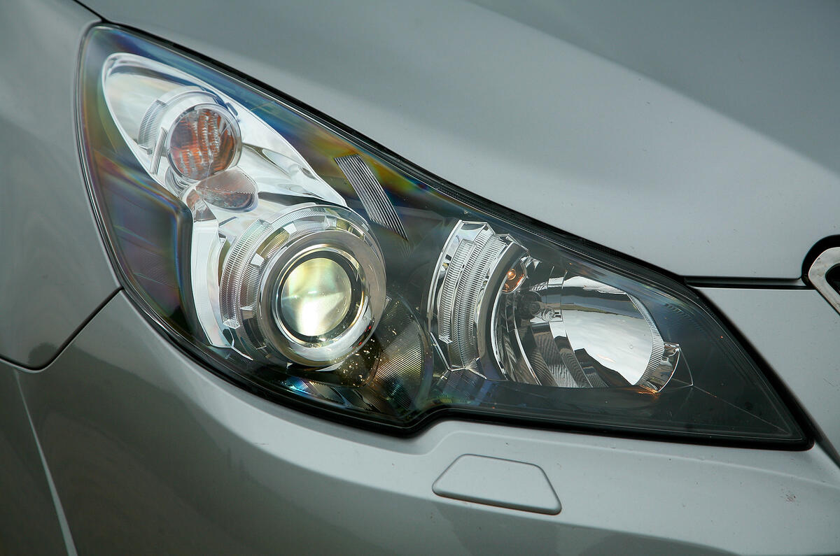 The headlights are extended and show off the internal components for a high-tech feel Subaru Legacy xenon headlights