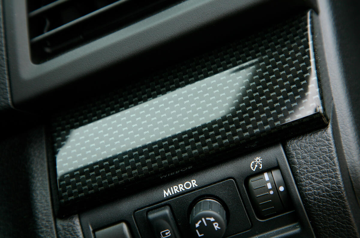 Subaru has gone for a high-tech carbonfibre look for the Legacy's cabin Subaru Legacy centre console
