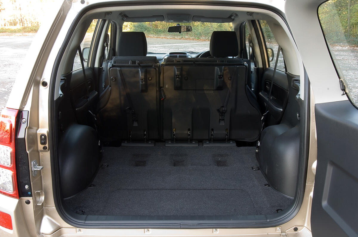 Large, square opening to large, square boot; rear seats fold forward leaving flat floor; plenty of lashing hooks, too Suzuki Grand Vitara seat flexibility