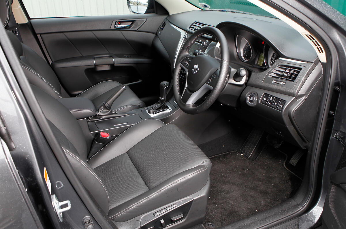 It’s a quality cabin with nice details, but front headroom and legroom are limited Suzuki Kizashi front seats