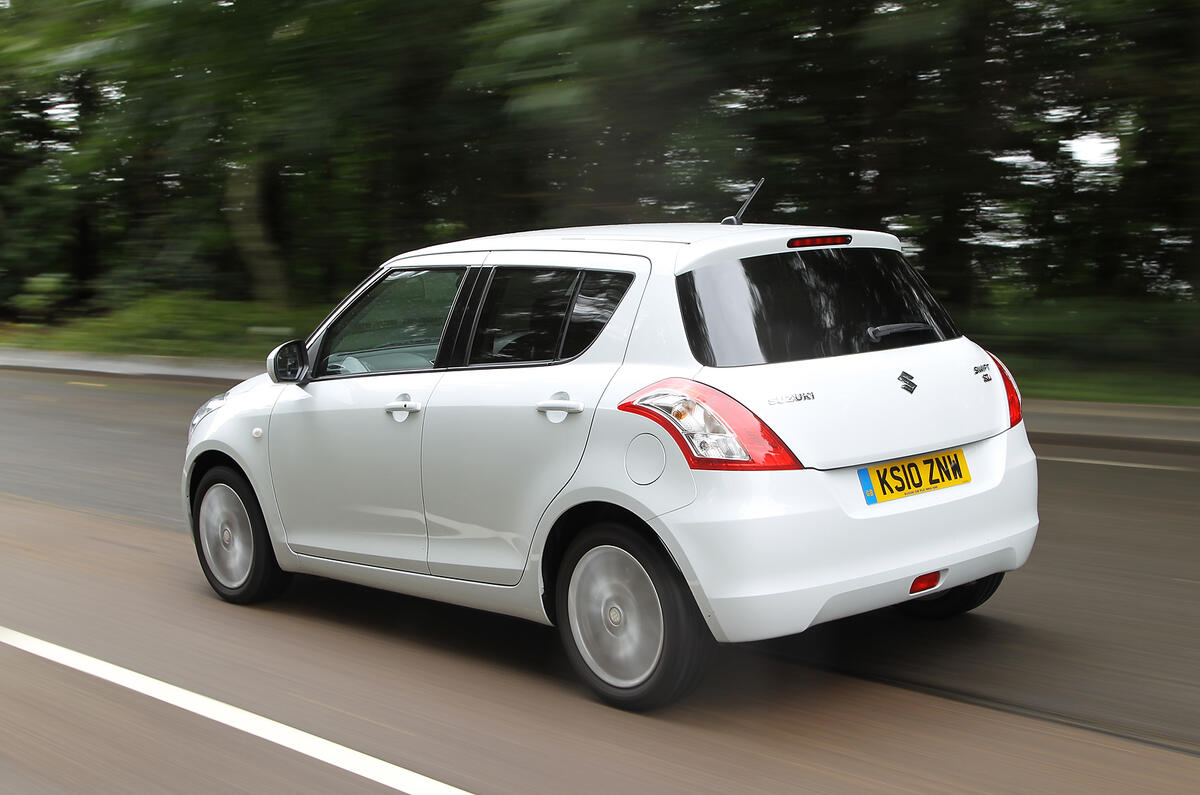 You have to use the gearbox to make progress, but it has a slick shift Suzuki Swift rear quarter