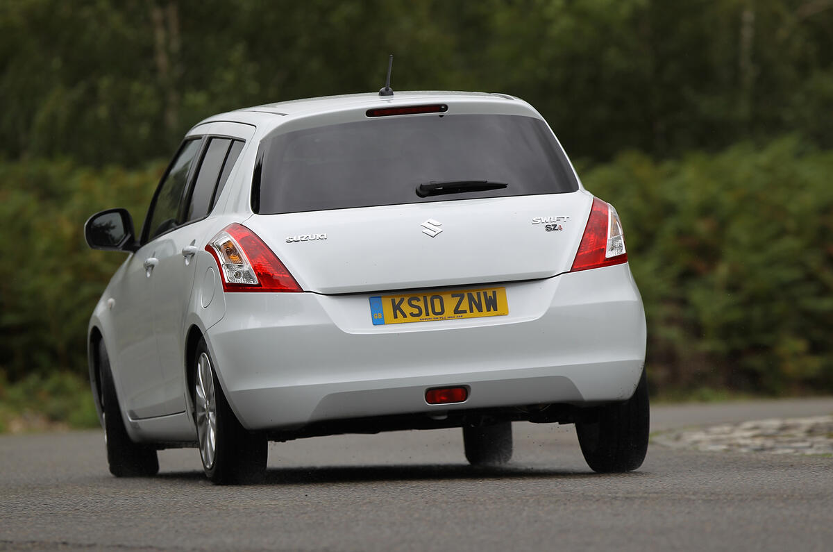 Good grip, above-average balance, neat body control and excellent brakes   Suzuki Swift rear cornering