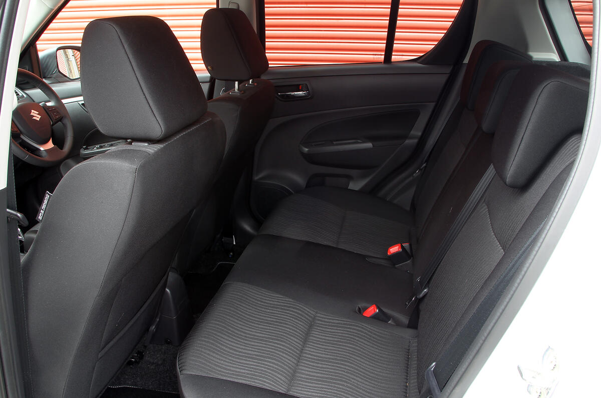 Roomy for your legs and feet, less so for your head. Good thigh support, though Suzuki Swift rear seats
