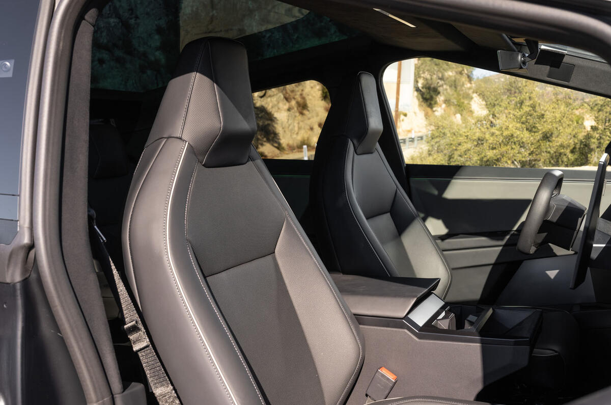 Tesla Cybertruck review 2024 14 front seats Tesla Cybertruck review 2024 14 front seats
