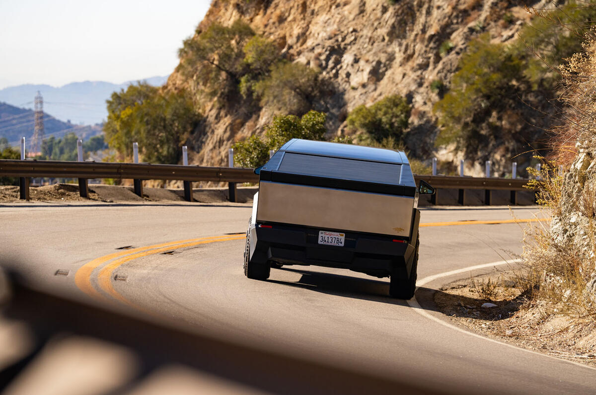 Tesla Cybertruck review 2024 25 rear cornering Tesla Cybertruck review 2024 25 rear cornering