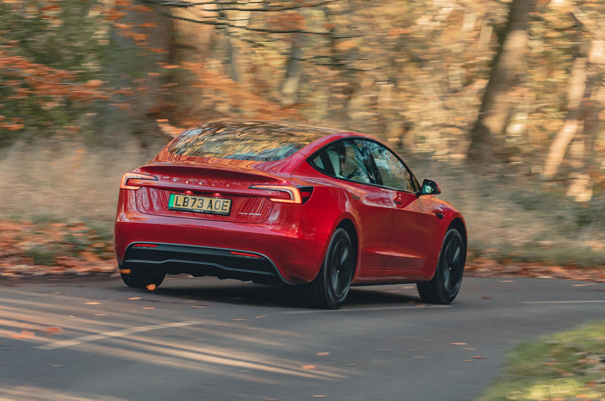 tesla model 3 road test review 20 24 03 cornering rear tesla model 3 road test review 20 24 03 cornering rear