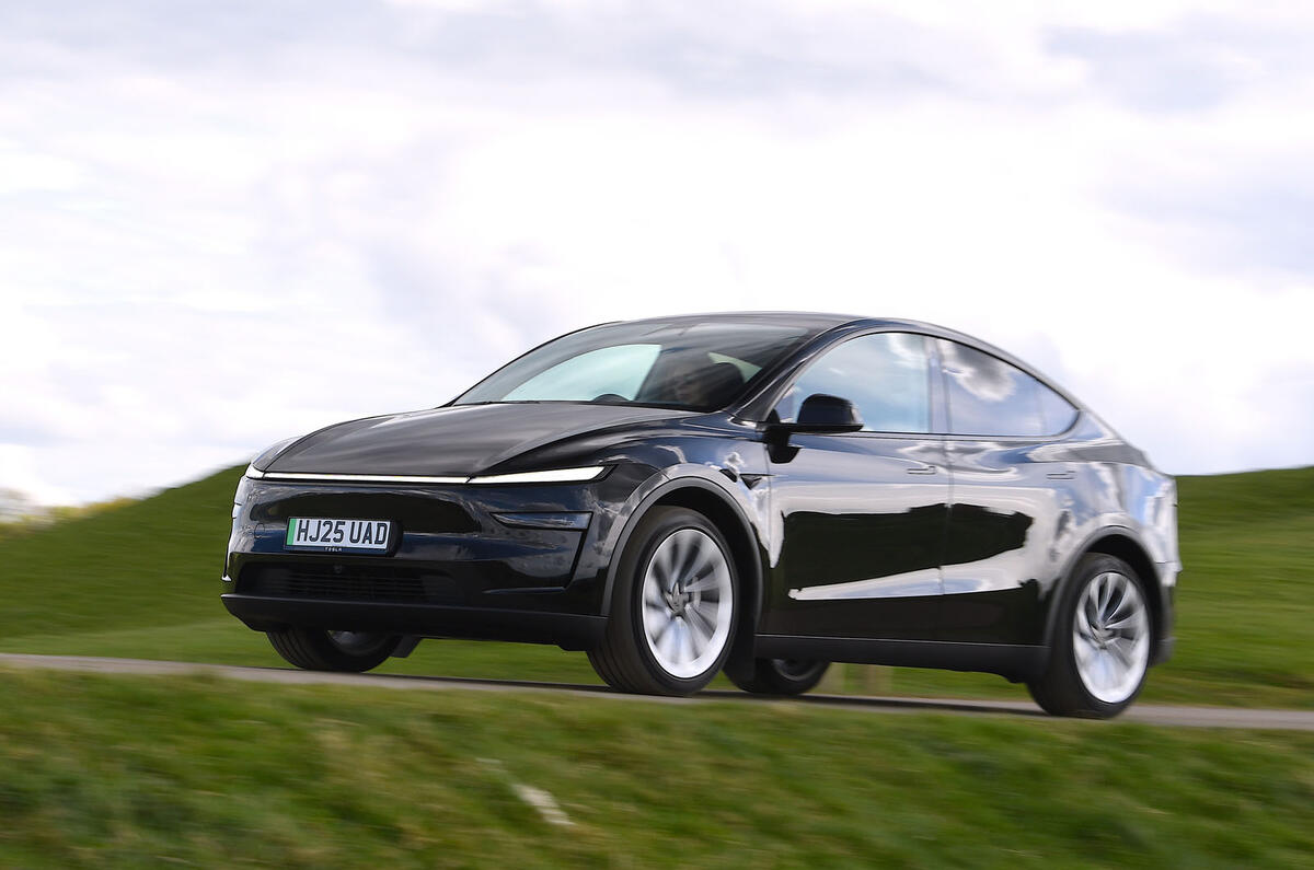 Tesla Model Y 2025 Review front action blur 9296 Tesla Model Y 2025 Review front action blur 9296