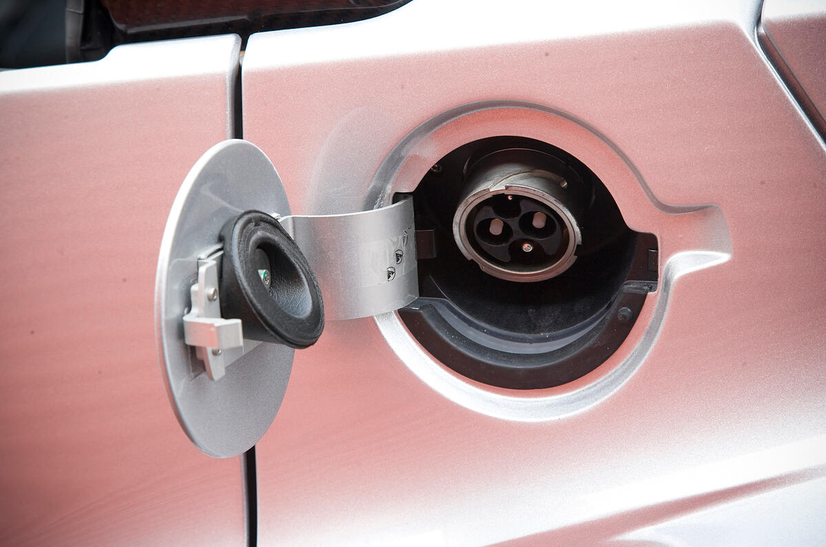 Behind what looks like a conventional fuel filler cap nestles the Roadster’s charging point Tesla Roadster charging point
