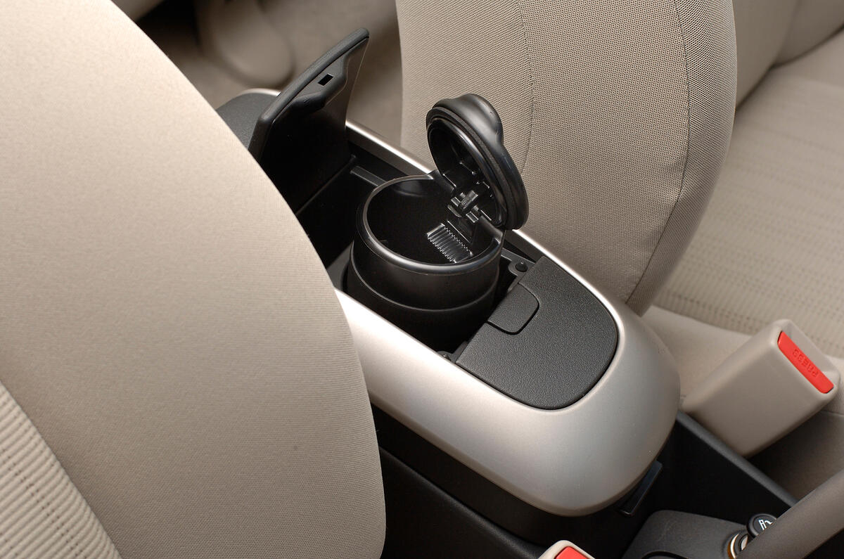 Cabin practicality is a strong point, even if design flair isn't Toyota Auris cupholder