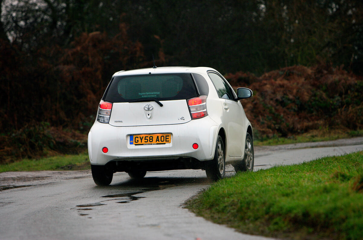 Discs brakes at all corners resist fade admirably Toyota iQ rear cornering