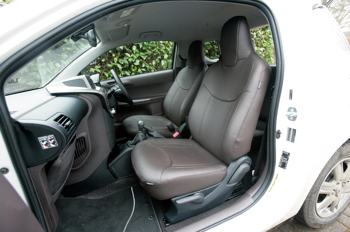 Front seats are thin but surprisingly comfortable, although you sit a little high Toyota iQ front seats
