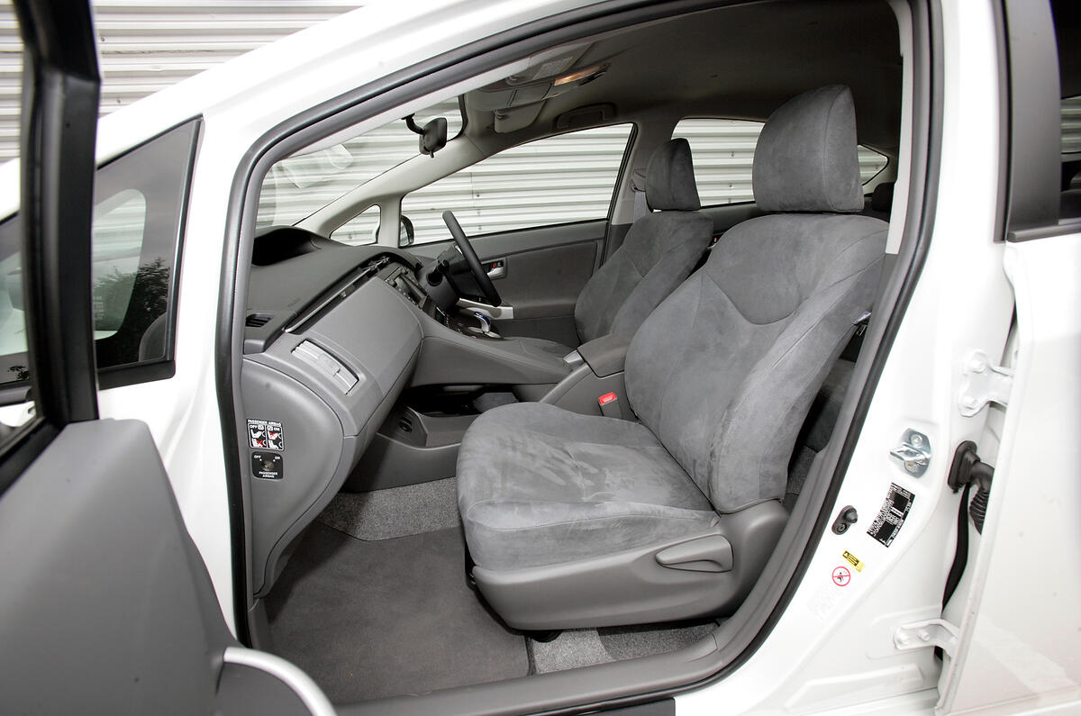 Mock suede-trimmed seats are very comfortable but lack electric adjustment Toyota Prius interior