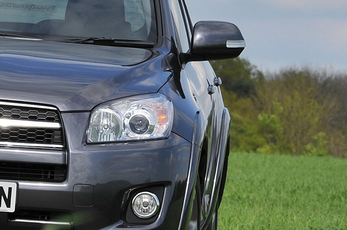 Elevated seating position provides good forward visibility Toyota RAV4 xenon headlight