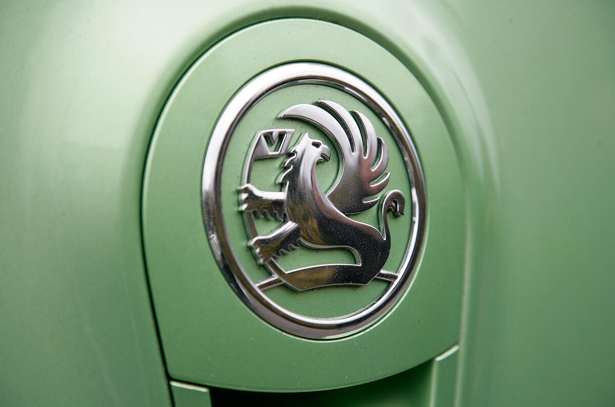 Big body-coloured boot handle looks and feels expensive Vauxhall badging