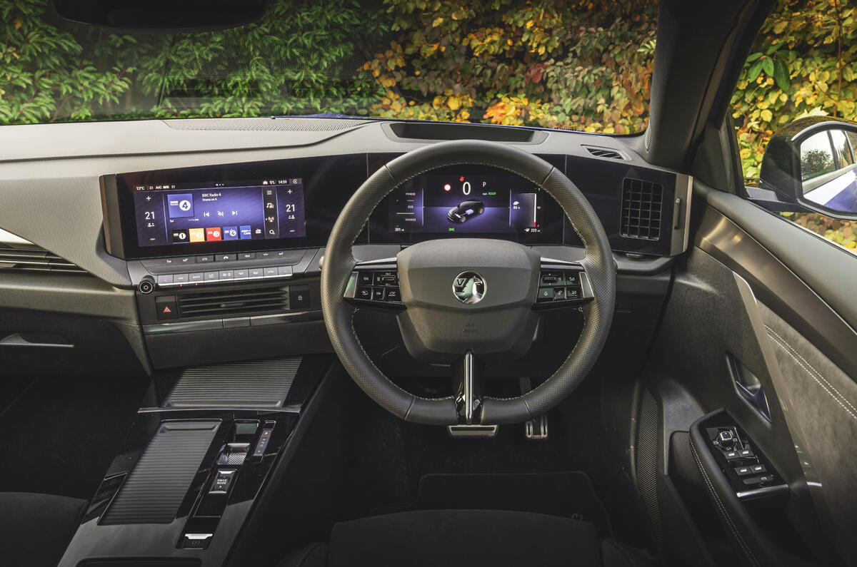 Dual 10-inch driver-facing screens with retained physical climate controls