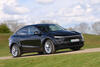 Tesla Model Y 2025 Review front action blur 9295 Tesla Model Y 2025 Review front action blur 9295